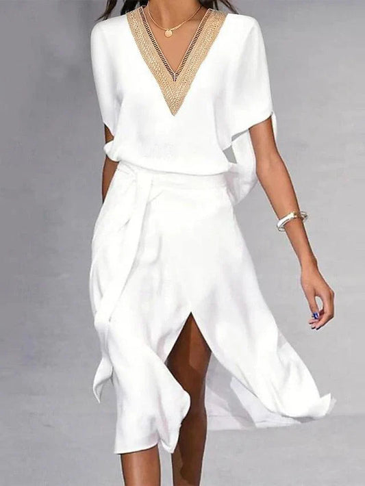 Isabella – robe midi blanche moderne avec col en v